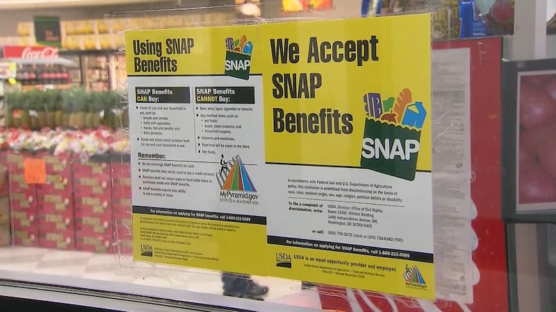 People were lined up for a food giveaway, many of which the executive director says are...